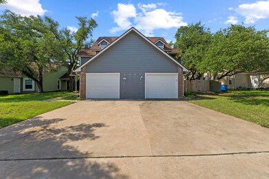 View of front of property featuring brick siding 
