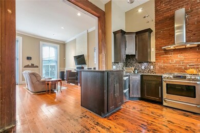 Kitchen and breakfast nook are separated from den
