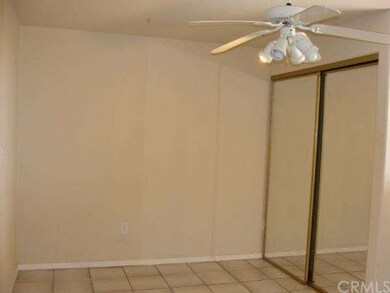 2nd bonus room as a closet and ceiling fan.