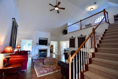 Soaring ceilings and an open floor plan makes this a truly 