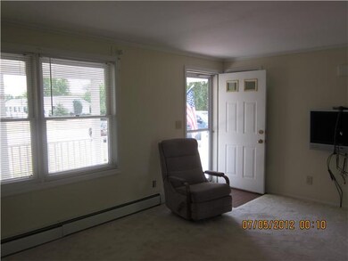 Living Room. Wood floors under carpet.