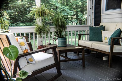 Wooden deck featuring an outdoor hangout area