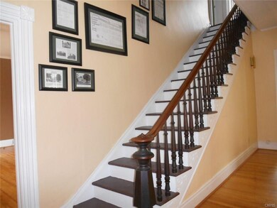 Front entrance leads to a spacious hallway with li