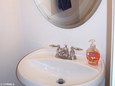 Other - Powder Room with Hardwood Flooring & Pedes