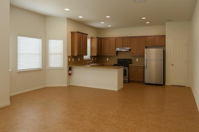 Kitchen with stainless steel appliances, under ca