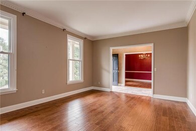 This 18x14  room can be a formal living room, office, library, music room or what ever you need it to be. It has beautiful hardwoods and overlooks the front of the house. 