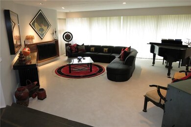 SUNKEN LIVING ROOM WITH AN ORIENTAL FLAIR