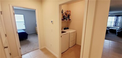 To the end of the hall to the left is the 4th bedr