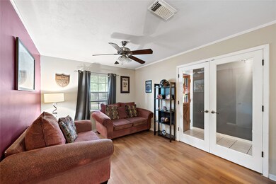 Large study with french doors off the entry.  This area could be a formal living area, play room or even a 4th bedroom.