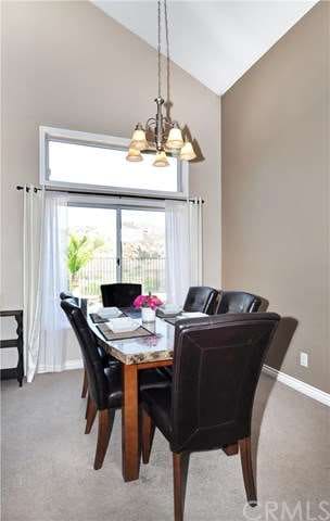 Dining area also enjoys the view and features newe