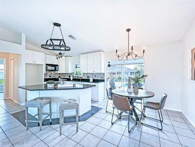 Open concept kitchen overlooking dinette area