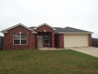 Single story home with undeveloped land directly a