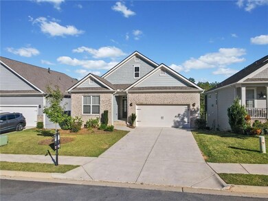 Craftsman inspired home featuring a front yard and