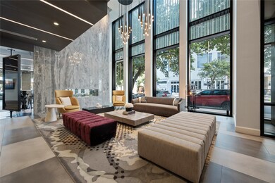 This Luxurious Lobby offers a nice Fireplace