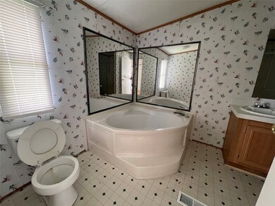 Mater Bathroom with tub and shower
