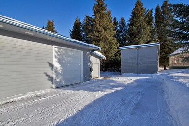 3rd bay door and the boat shed