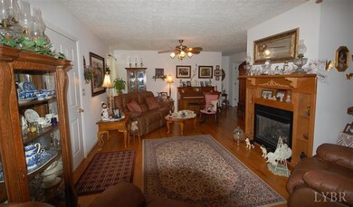 Spacious great room with custom-made mantle