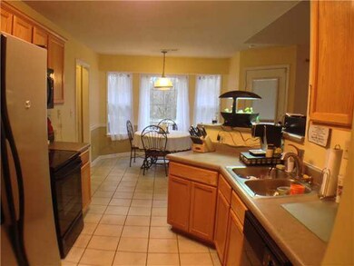 open kitchen with breakfast room