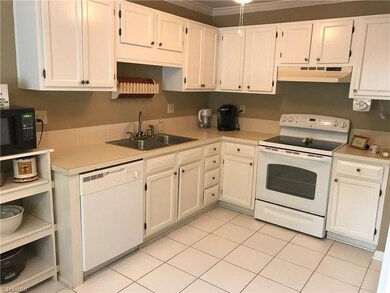 Large eat in kitchen with tile flooring