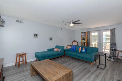 Front Living Room w/ view of patio