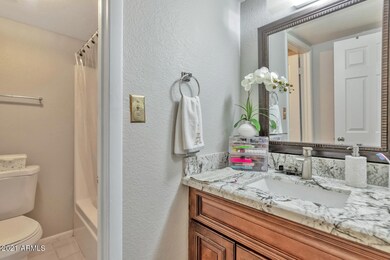 3067 N 89th Ln-large-013-014-3067 N 89th