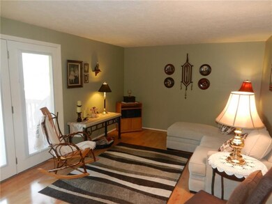 Relax in the living room with a walkout to the dec