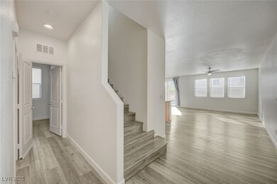 Stairway and entrance to living room
