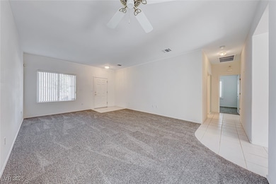 Empty room featuring a wealth of natural light, li