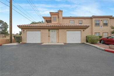 View of front of property featuring a tile roof, a