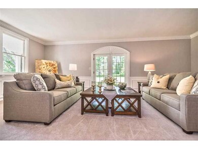 Living Room. An original marble step flanked by wr