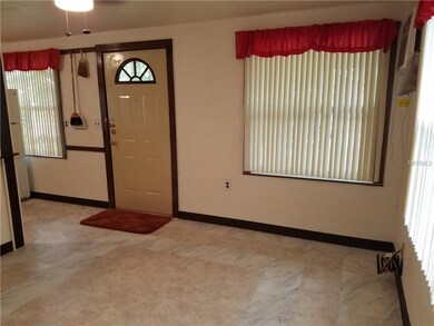 Enter into Great Room that Combines Kitchen & Livi