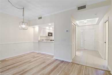 Dining area with room for stools at kitchen counter.