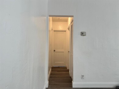Hallway to bedrooms and bathroom