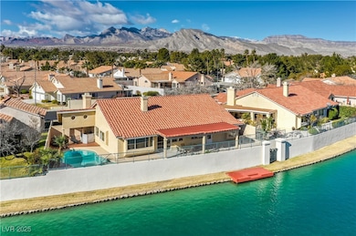 View of swimming pool featuring a water and mounta