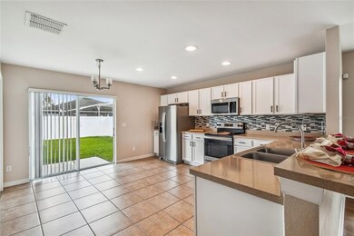 Kitchen with eat-in space - overlooks private backyard with new vinyl fencing