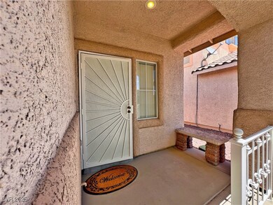 Doorway to property featuring stucco siding