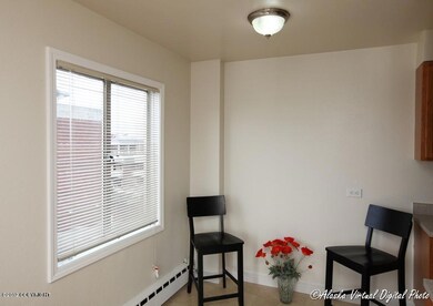 Dining Off Kitchen With Large Window