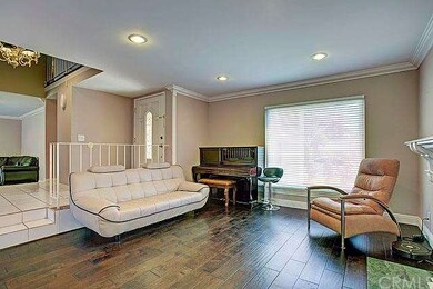 This is a step down formal living space accented w