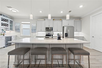 Kitchen featuring appliances with stainless steel