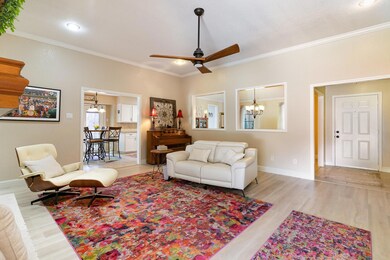 Living area looking to kitchen