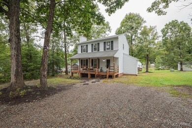 View of front of home featuring a deck and a front