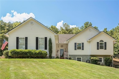 View of front of house with a front yard