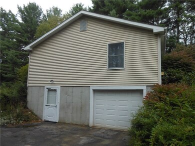 EXTERIOR SIDE - WALKOUT - INTEGRAL GARAGE
