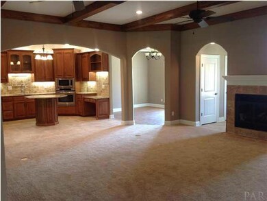 Formal dining room is located to the right of the kitchen