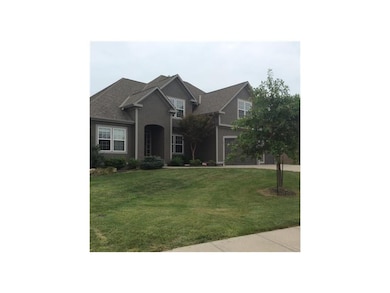 1705 Knoll Creek Ln, Raymore, MO 64083 - photo 2