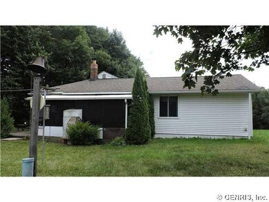 Exterior Back. Screened in porch!  Price is right.