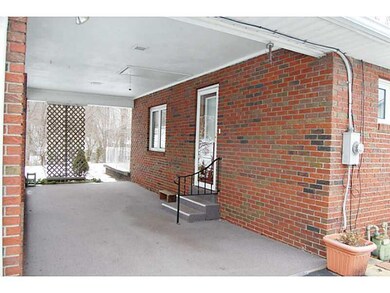 Exterior Front. Fabulous covered side porch is so 