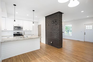 Dining space/ kitchen/ fireplace