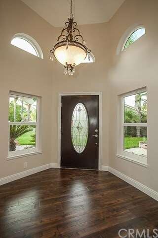 Grand entry foyer located in turret surrounded by 