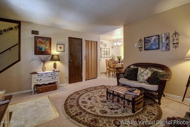 Living is open to dining and kitchen